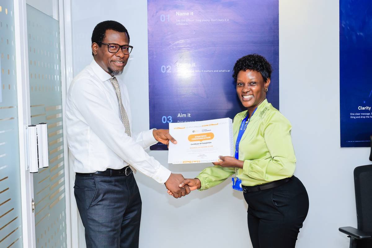 Certificates awarded on the strategic communication programme, Stanbic Bank Uganda